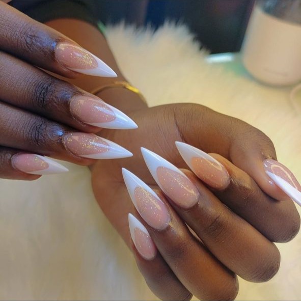 Classic French tip manicure at ClawsUG Nailspot